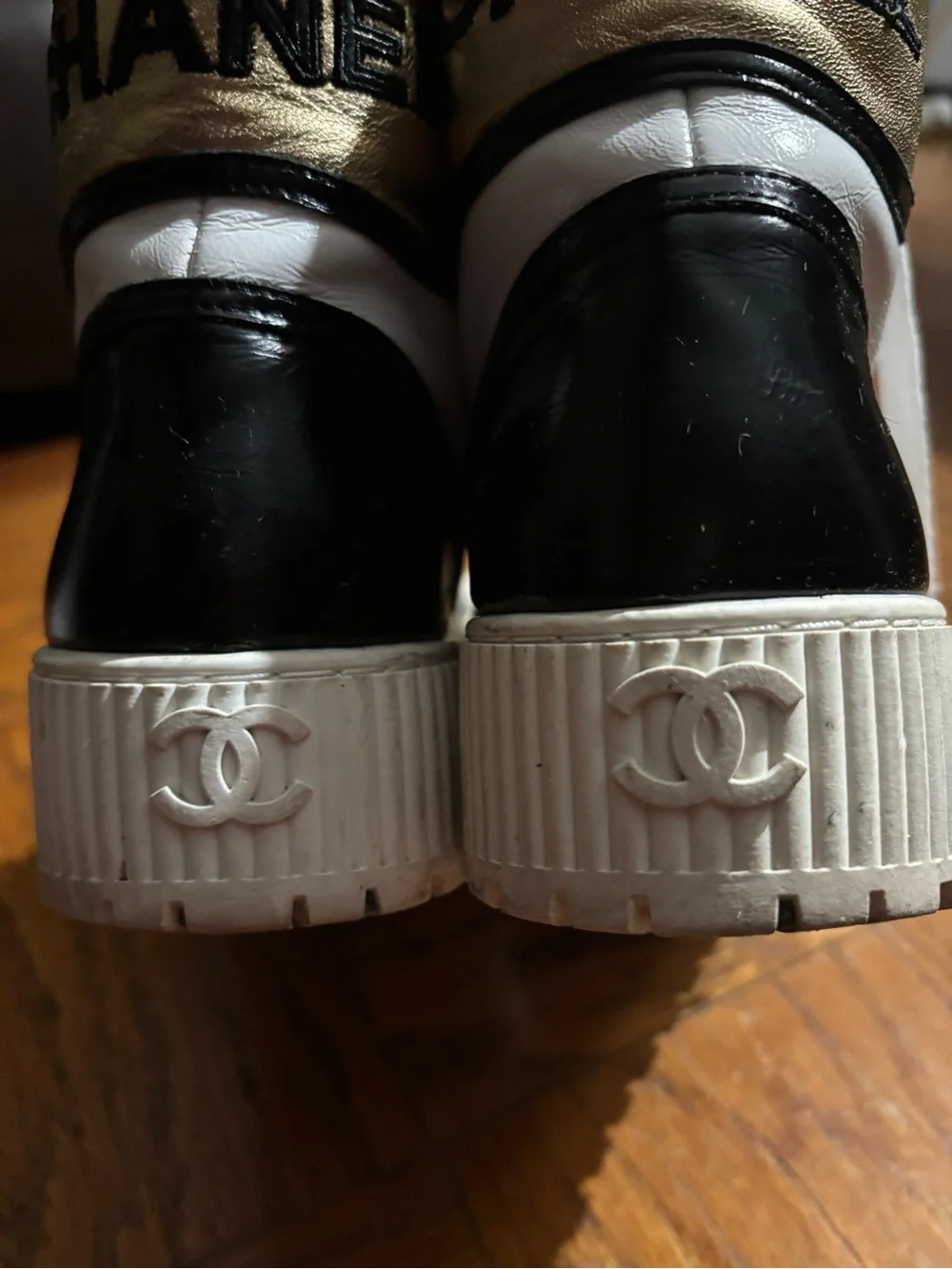 CHANEL White and Black Logo High-Top Sneakers